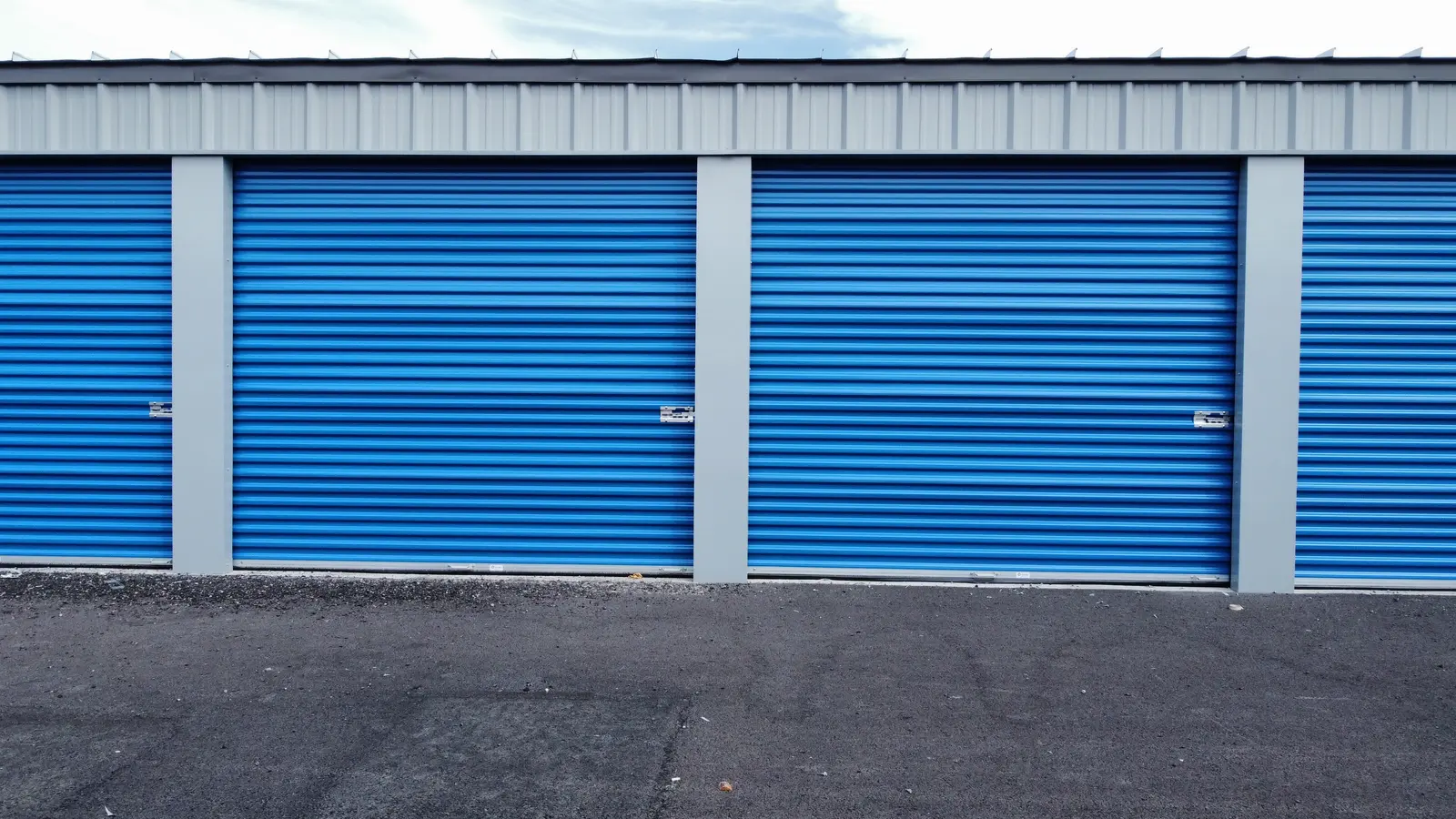 Self-storage roll-up unit doors close up on a Wasatch Structures metal building