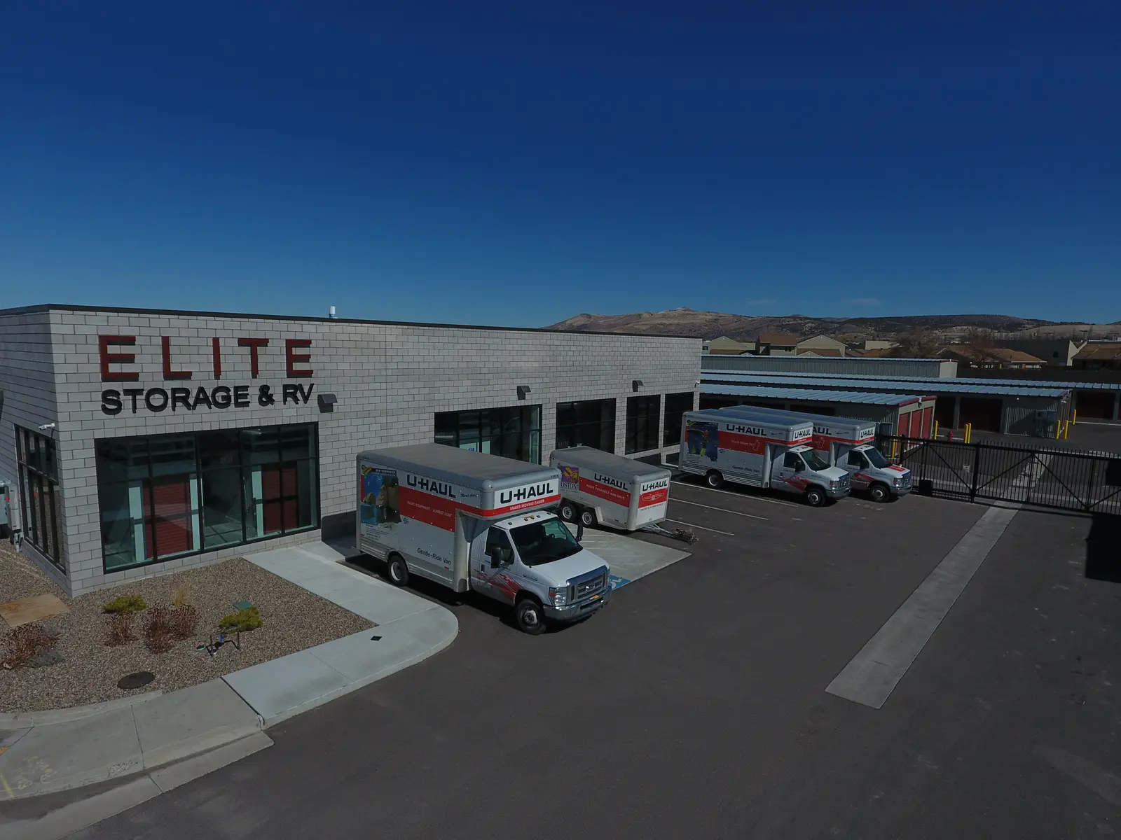 Elite Storage and RV steel self-storage facility in Rexburg, Idaho, with mountains behind