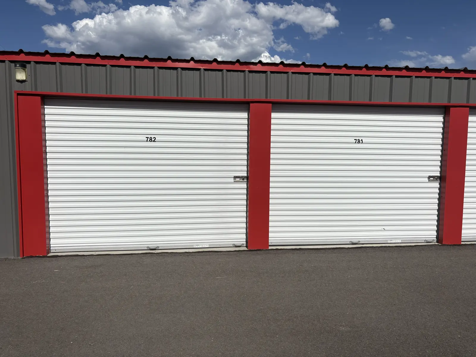 White roll-up doors on a Wasatch Structures metal self-storage building, Chubbuck Idaho